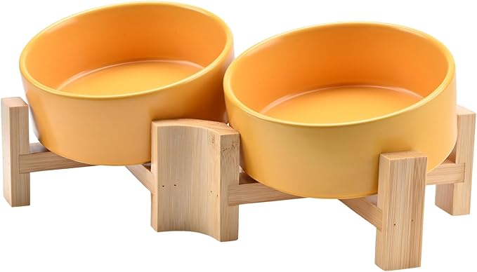 SPUNKYJUNKY 15° Slanted Ceramic Dog and Cat Bowl with Wooden Stand, Tilted Bulldog Food and Water Bowl No Slip Non-Spill for Cats Medium Dogs Big Face Pets 13.5 OZ (1.7 Cups, Yellow × 2)